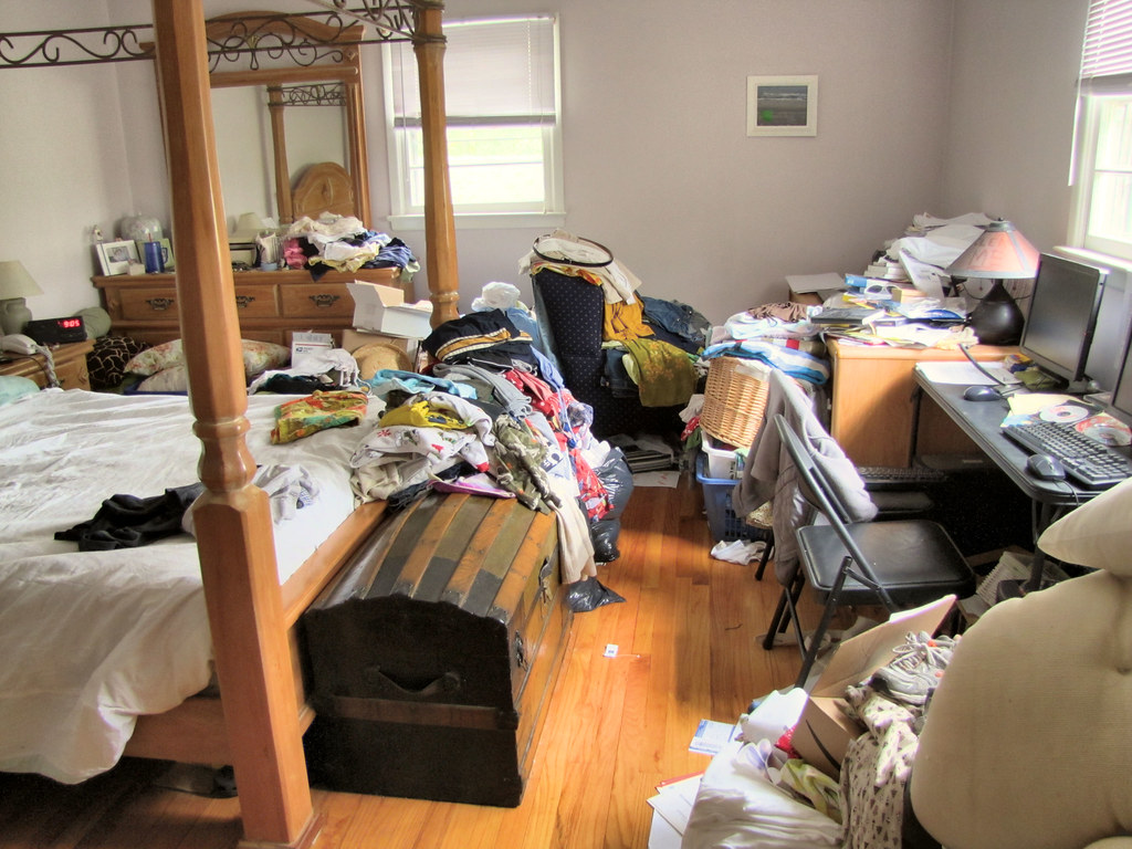 cluttered home Home Organization and Home Watch by Nancy's Concierge Services